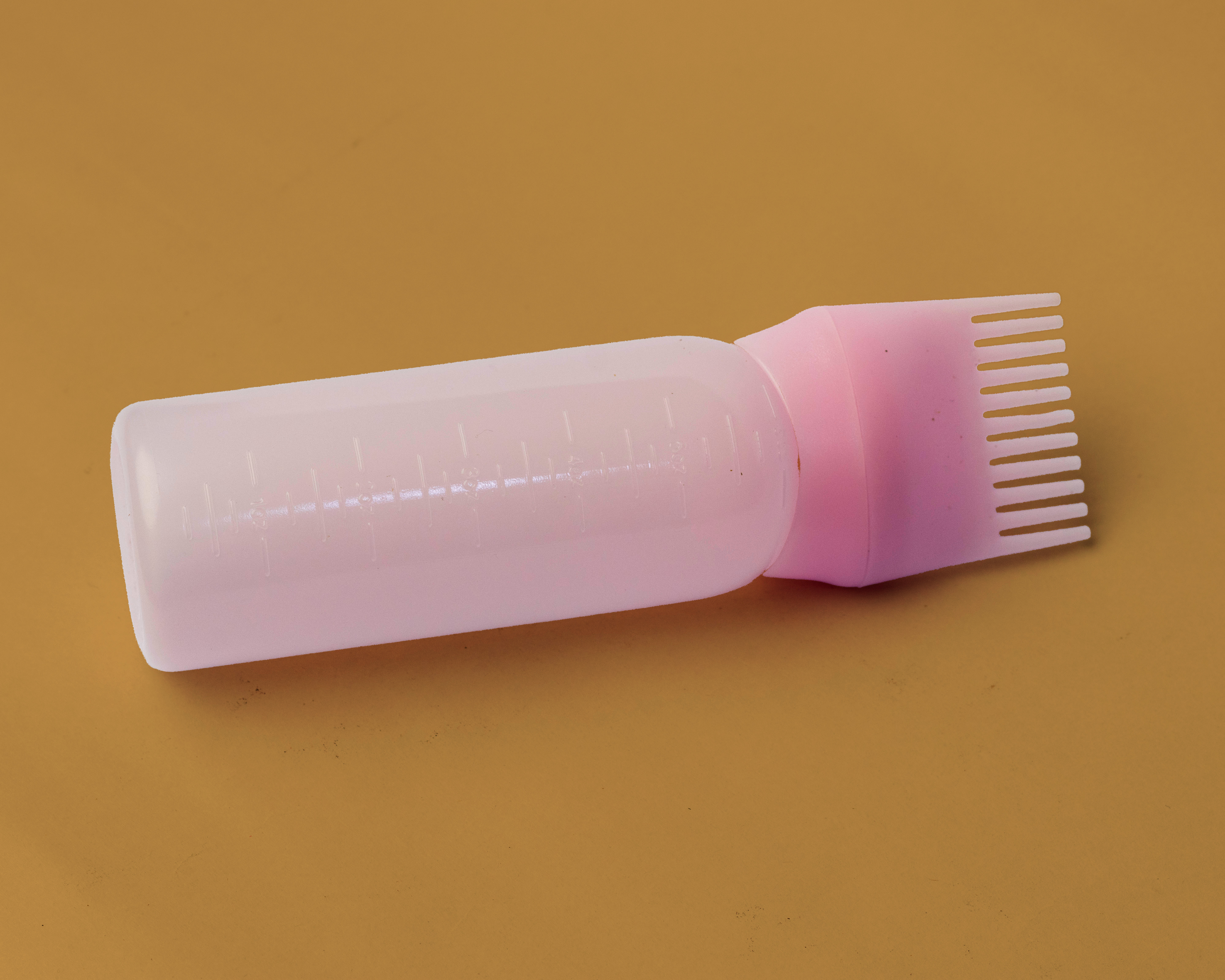 Pink Oil Comb